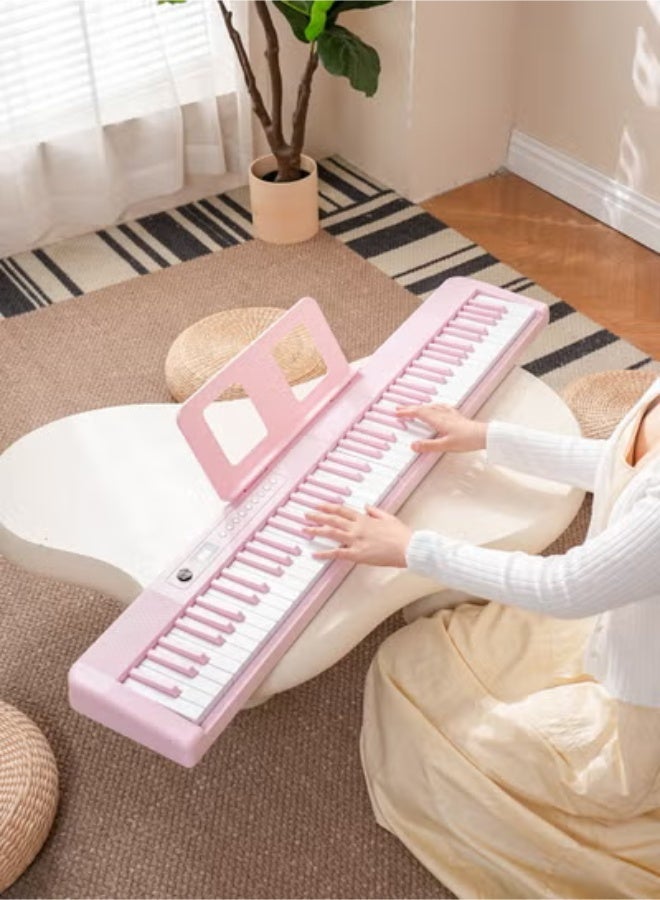 والالا بيانو ذكي MIDI قابل للطي بالحجم الكامل للمبتدئين والبالغين، بيانو إلكتروني محمول متعدد الوظائف قابل لإعادة الشحن مع دواسة استدامة للبيانو الإلكتروني 88 مفتاحًا وحقيبة بيانو، سماعات أذن كبيرة، دواسة استدامة، مشبك موسيقى، قماش بيانو، غطاء بيانو 88، ورقة موسيقية 88، كابل OTG، كابل صوت، وردي 3.8 كجم - Image 2