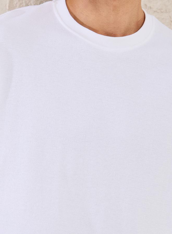 ستايلي تيشيرت أوفرسايز بتفاصيل متباينة سادة - Image 3