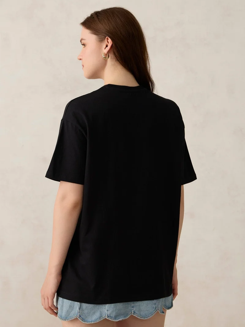 Outzidr  Black Graphic Oversized T-Shirt for Women | Best Price UAE