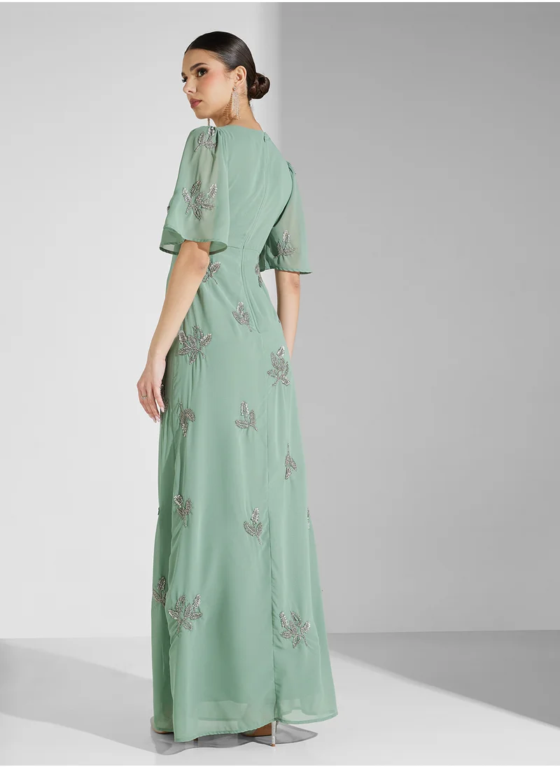 مايا Placement Beaded Knot Front Maxi Dress With Angel