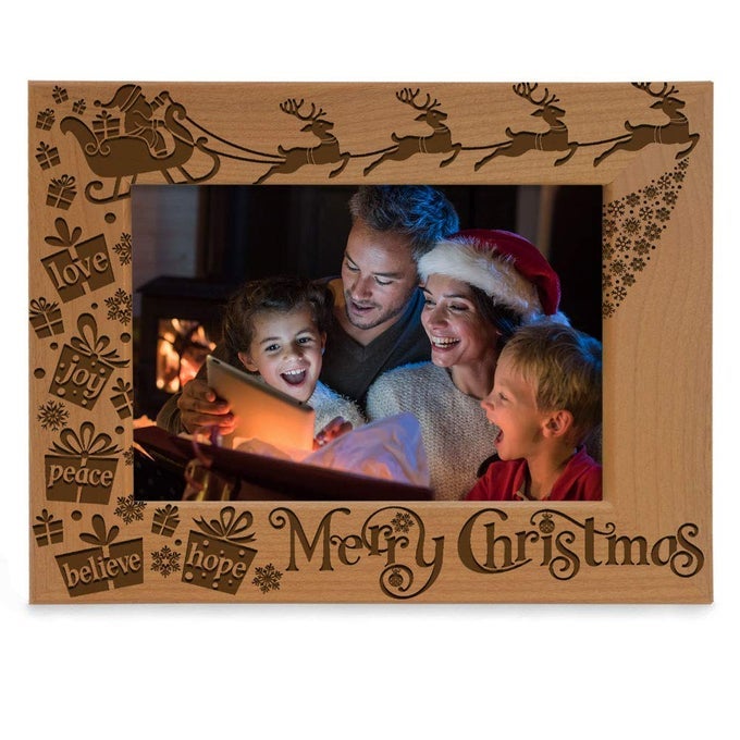 MERRY CHRISTMAS LOVE PEACE JOY BELIEVE HOPE THE MAGIC OF CHRISTMAS FAMILY PICTURE FRAME SANTA REINDEER AND SLEIGH DECOR ENGRAVED NATURAL WOOD PHOTO FRAME 4X6HORIZONTAL