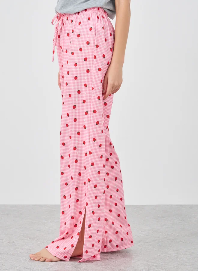 Styli Styli Women Strawberry Print Dropped Shoulder T-Shirt and Side Slit Pyjama Set