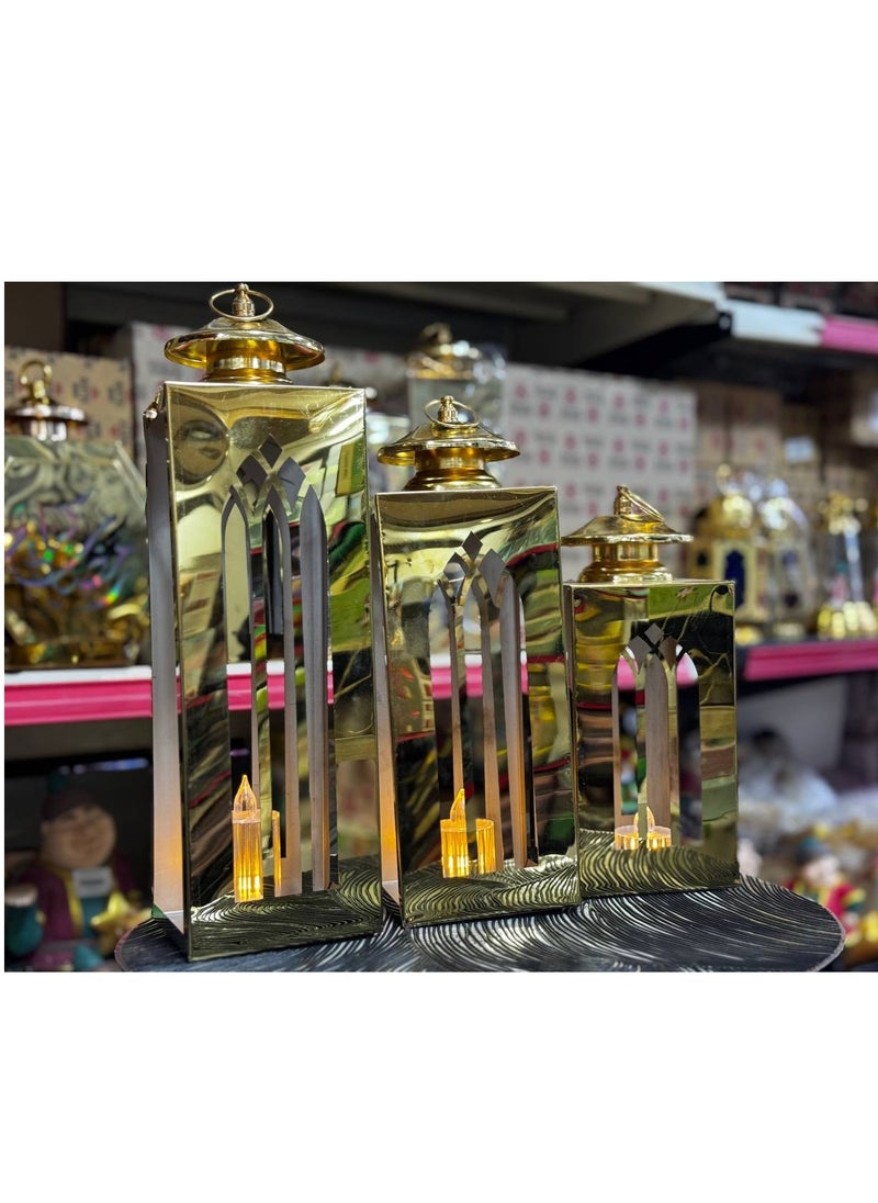 Generic - Gold metal hexagon lanterns set 3 pieces In addition to the 3-piece electronics wax kit You can add a distinctive and attractive metal character to your home decor, a luminous masterpiece with a wonderful design. It adds a touch of sophistication and elegance to your home decor. The lantern is made of elegant metallic ornate metal, which is a luminous decoration. It fills the surroundings of the area with a beautiful, softly bright glow. - Image 1