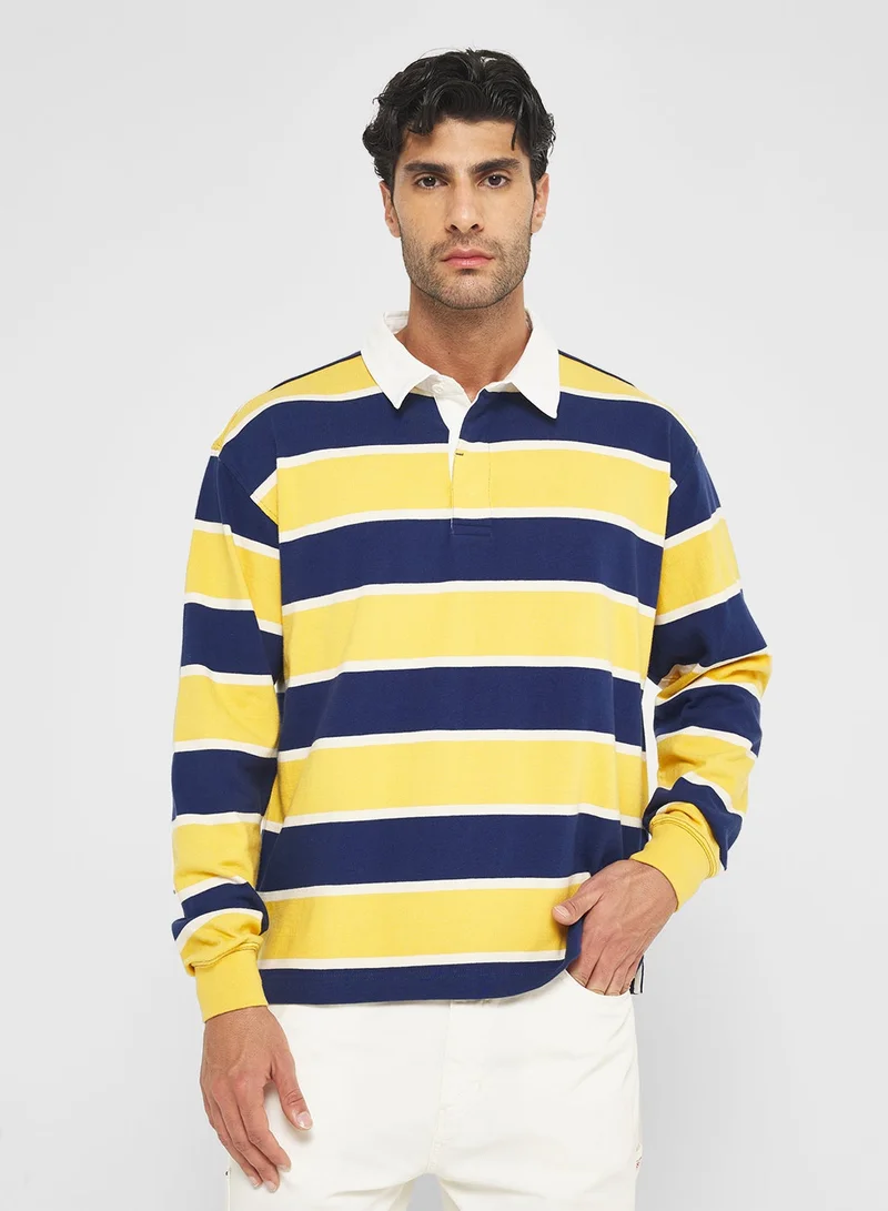 جس قُميص بولو مخطط بالرجبي