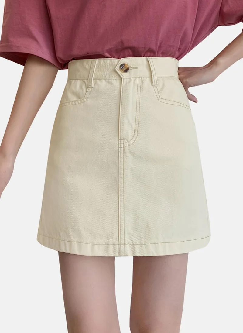 يونيكي Beige Solid Denim Mini Skirt