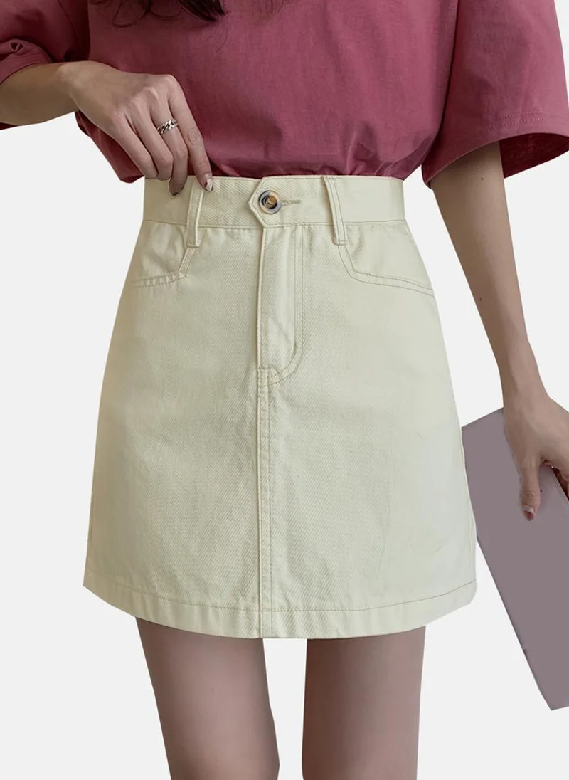 يونيكي Beige Solid Denim Mini Skirt