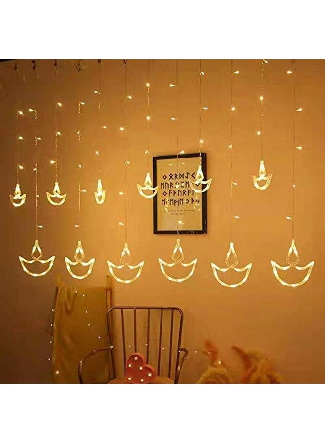 Desidiya Warm White Diya/Diwali Light Curtain, Led String Copper Lights with Pack of 12 Hanging Diyas, 8 Flashing Modes, Decoration, Prong Base, 2.5 Meters - Image 3