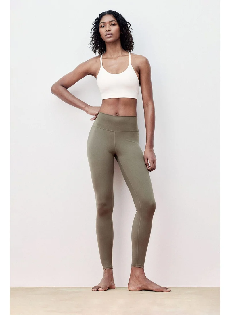 H&M Pocket-detail sports leggings in DryMove™
