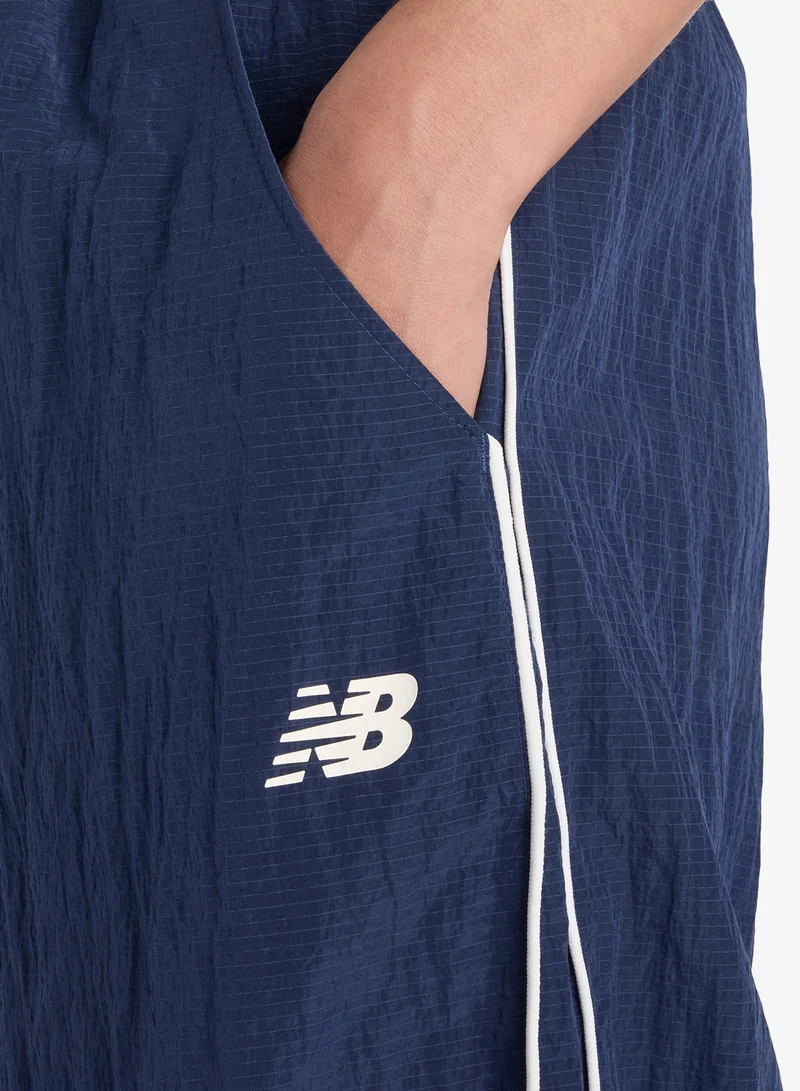 New Balance Essentia Legacy Woven Pants