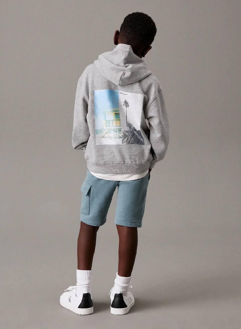 كالفن كلاين جينز هودي كبير الحجم مزين برسومات على الظهر - Image 2