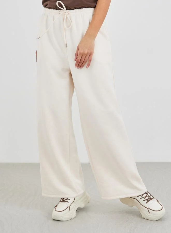 ستايلي Styli Women Cream Suede Look Wide Leg Joggers
