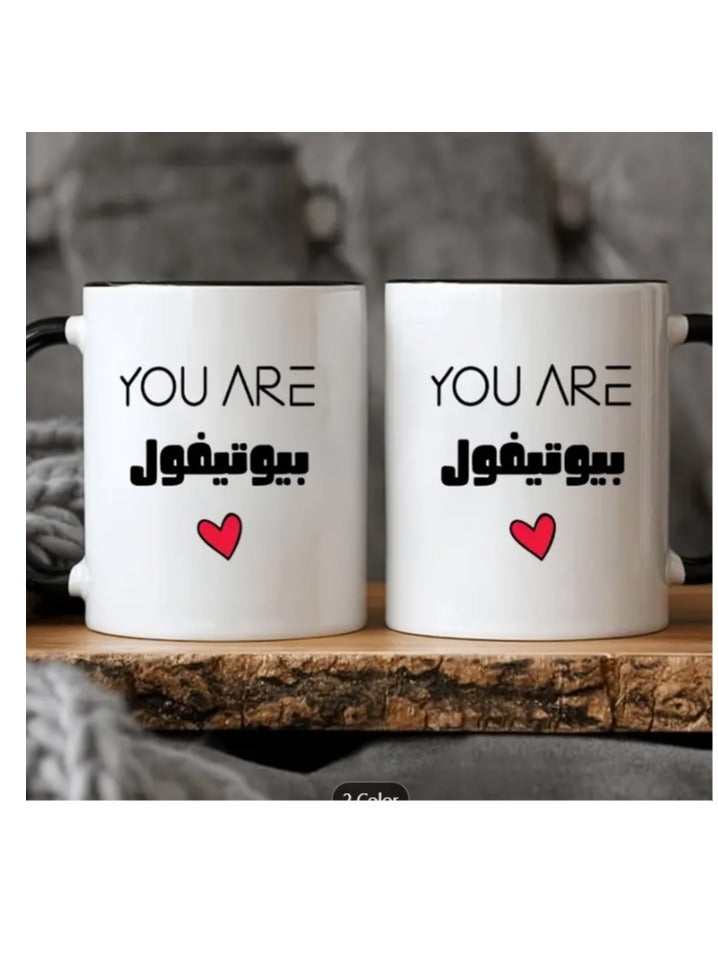 راين كوب قهوة سيراميكي باللون الأسود مكتوب عليه "أنتِ جميلة" - Image 2