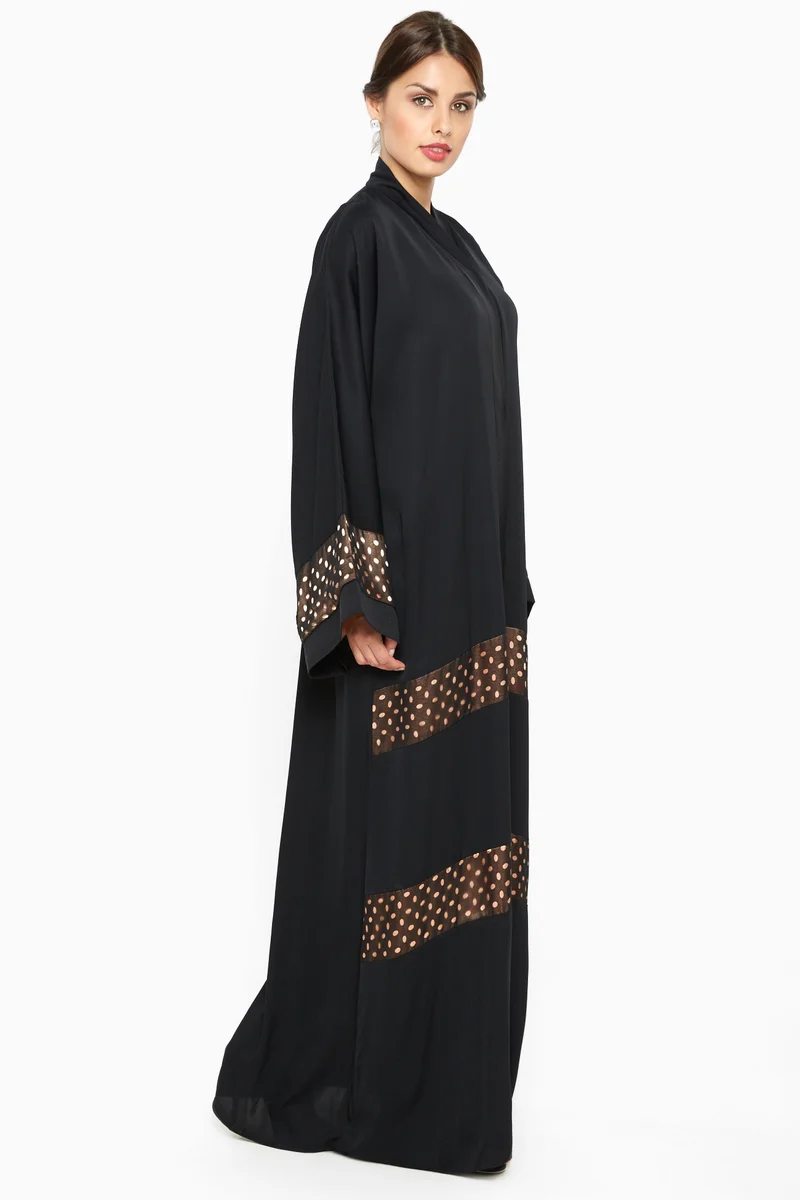 النخبة A gorgeous abaya with laser cut detailing by the sleeves and ends -AJ538A