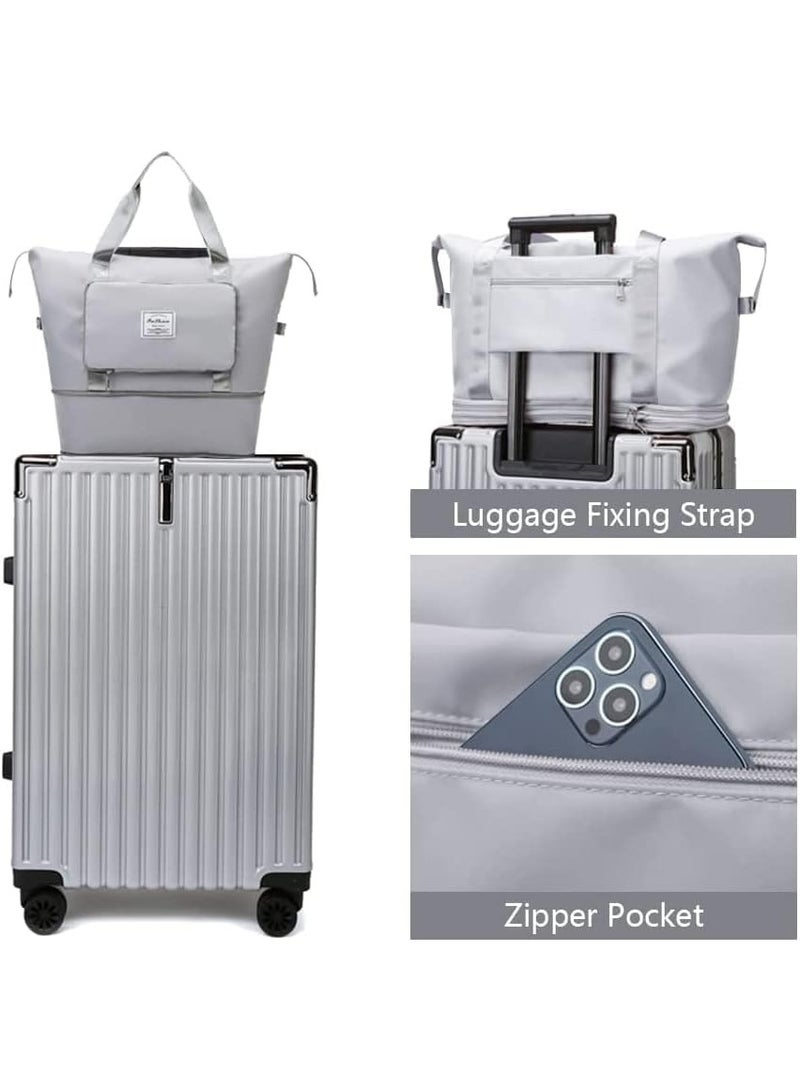 A multi-purpose bag that folds easily, features a front pocket and a top zipper, and can be attached to the handle of a suitcase. Designed to combine style, comfort, and practicality, this bag is available in gray. - Image 3