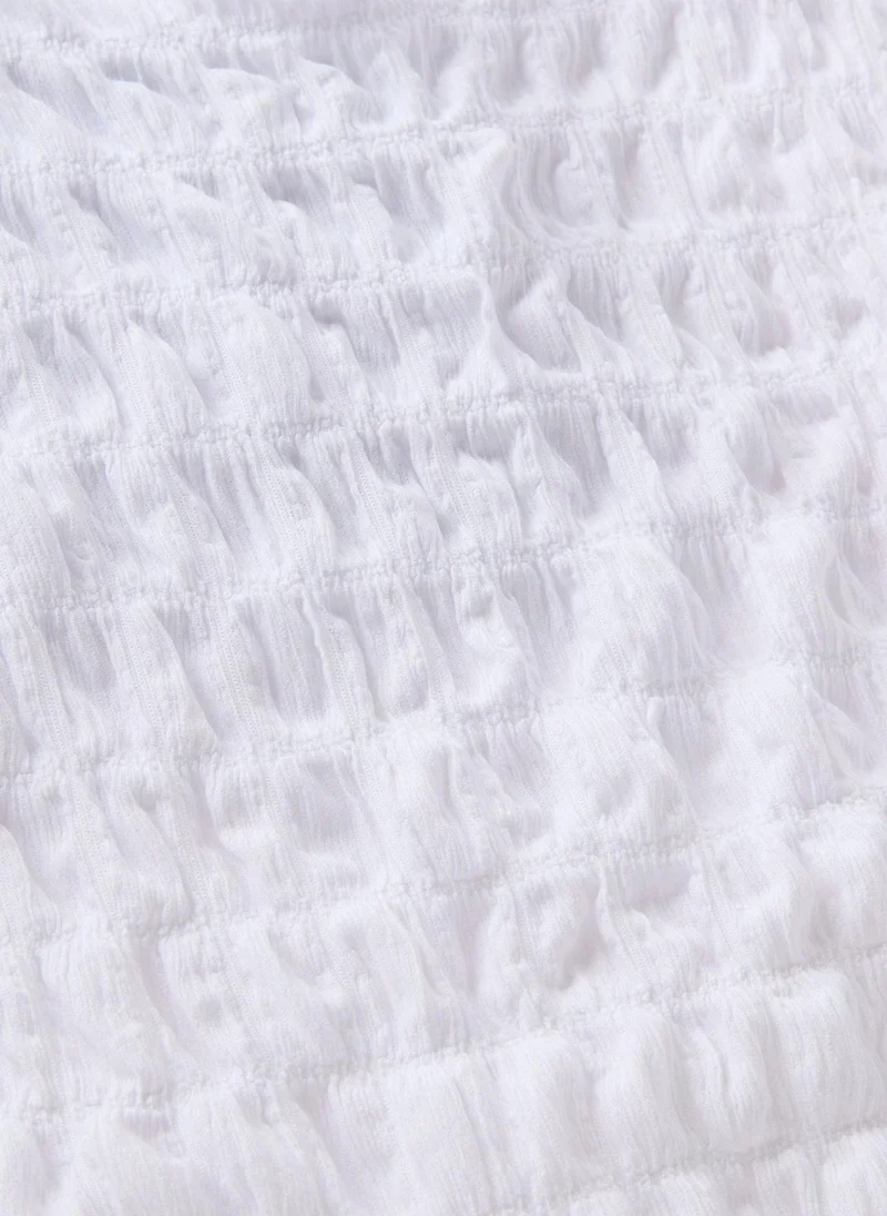 ماتلان عبوتان بلوزات بناتي سوداء وبيضاء مجعدة