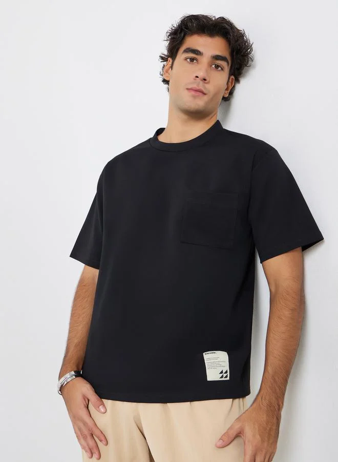 Styli Men Oversized Compact Stretch Heavy Jersey T-Shirt with Badge