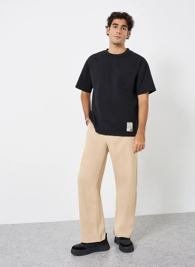 Styli Men Oversized Compact Stretch Heavy Jersey T-Shirt with Badge