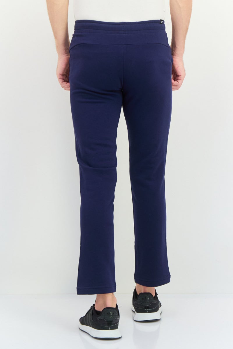 PUMA سروال رياضي للرجال بتصميم ملائم بشعار العلامة التجارية، أزرق داكن - Image 3