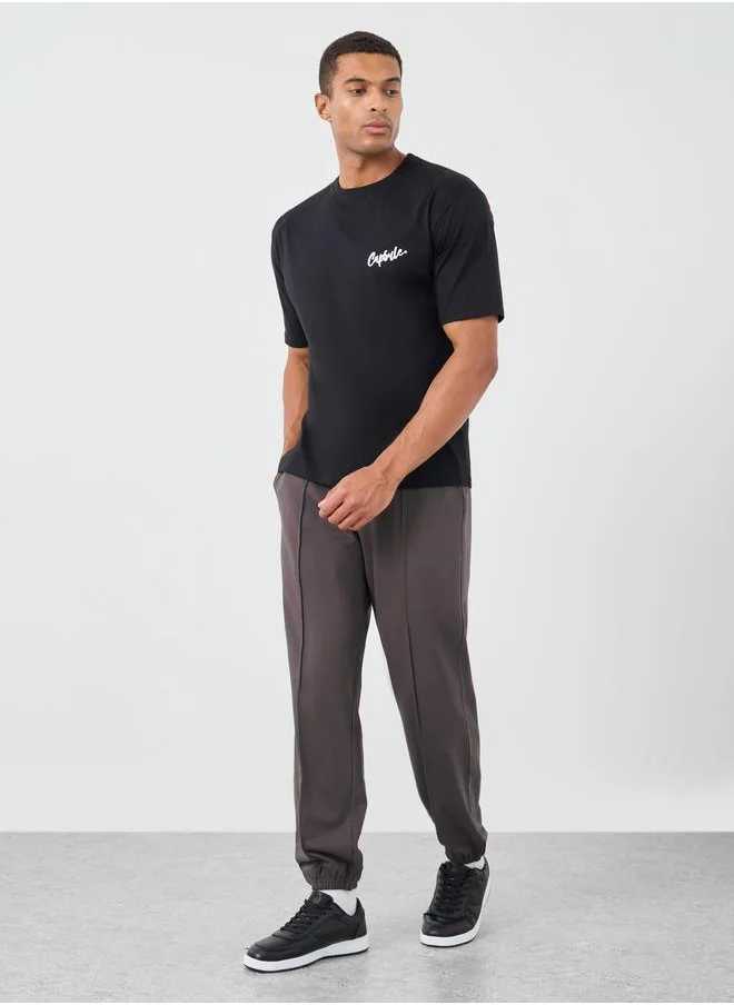 ستايلي Styli Men Coffee Brown Solid Pintuck Relaxed Fit Joggers