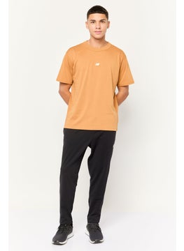 New Balance Men Relaxed Fit Short Sleeve Outdoor T-Shirt, Brown  - Image 2