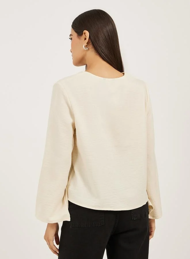 Styli  Styli Plain V Neck Linen Look Top with Tie Detail for Women | Best Price UAE