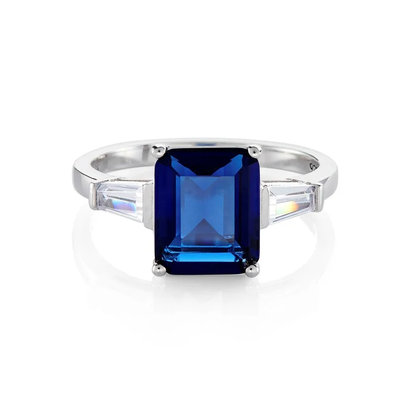 BUCKLEY LONDON THE FLAWLESS COLLECTION - SAPPHIRE BAGUETTE TAPERED BAGUETTE SHOULDER RING