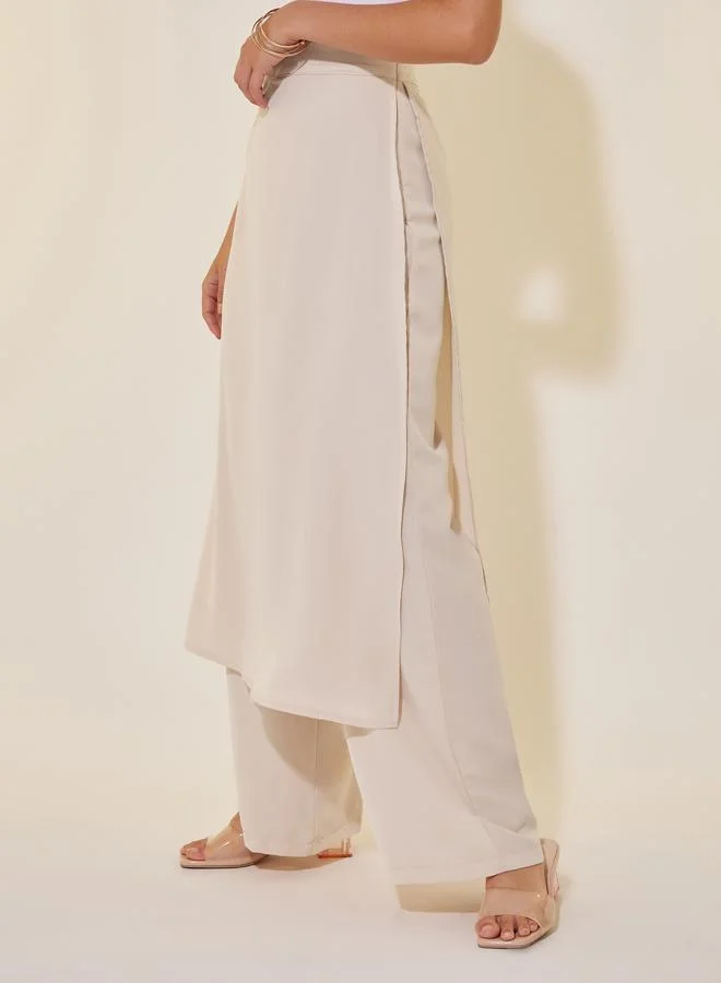 تايك تو بنطال سادة بأرجل واسعة وطبقات