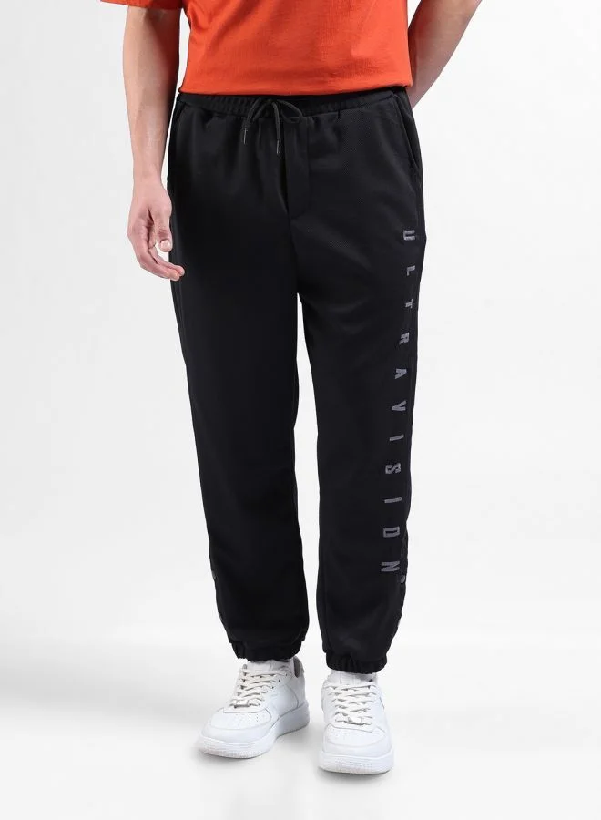 شركة المرآب الهندية Men Relaxed Fit Embroidered Side Pocket Mid-Rise Joggers