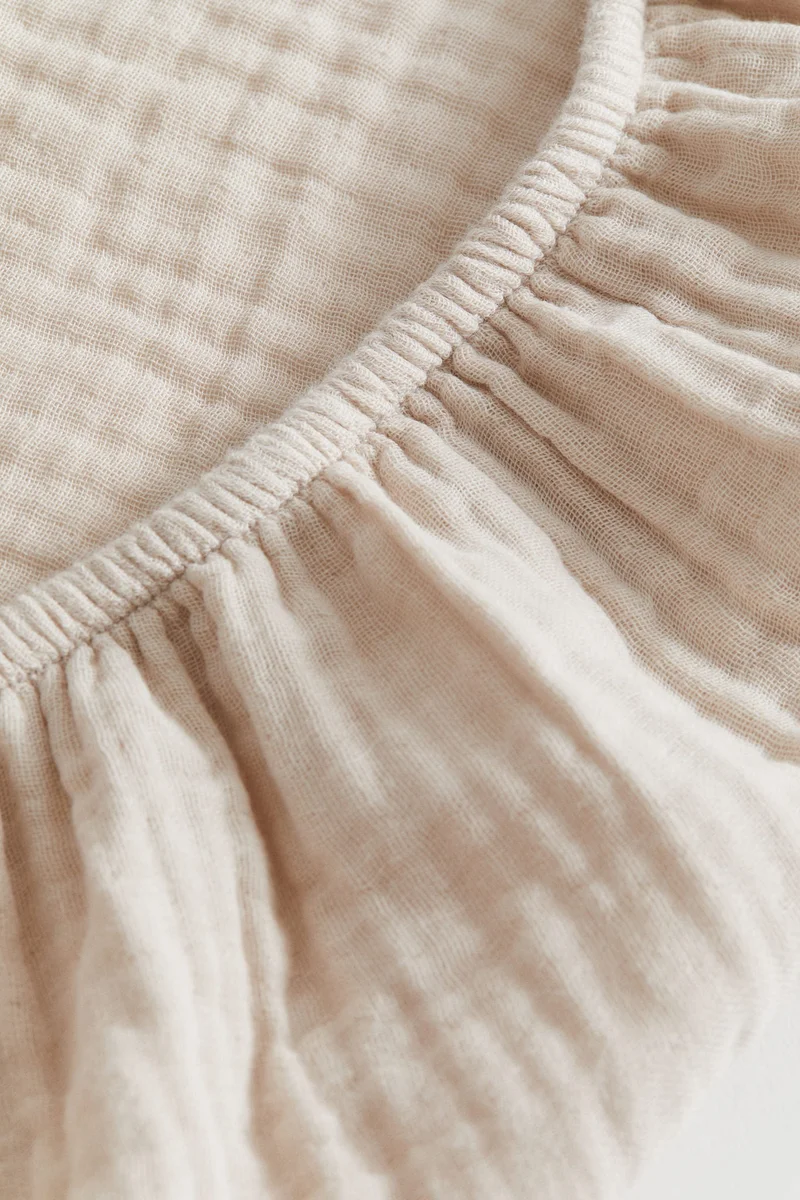 اتش اند ام غطاء وسادة التغيير من الموسلين