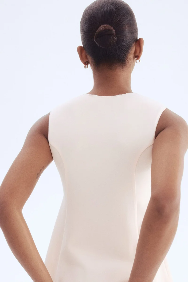 H&M Interlock peplum vest top