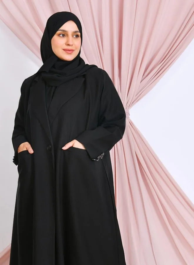 lamha abaya Black abaya with a formal cut, featuring pockets and buttons