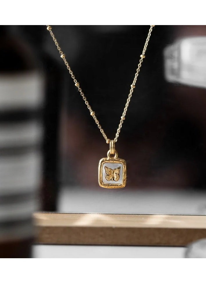 The Black Pearl Accessories - Stainless Steel Golden Necklace with a Butterfly Pendant White - Image 1