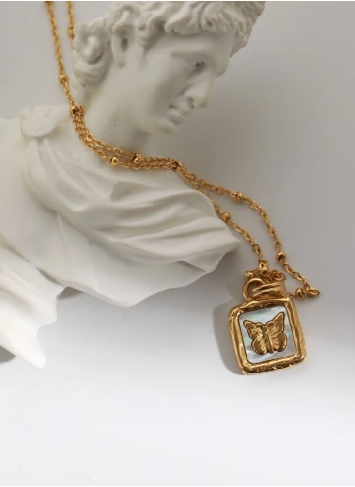 The Black Pearl Accessories - Stainless Steel Golden Necklace with a Butterfly Pendant White - Image 1