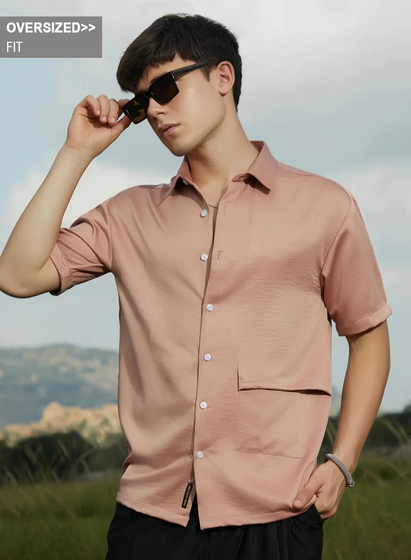 Campus Sutra Campus Sutra Men's Blush Pink Solid Flap Oversized Shirt For Casual Wear | Spread Collar | Short Regular Sleeves | Button Closure | Oversized Shirt Crafted With Comfort Fit For Everyday Wear