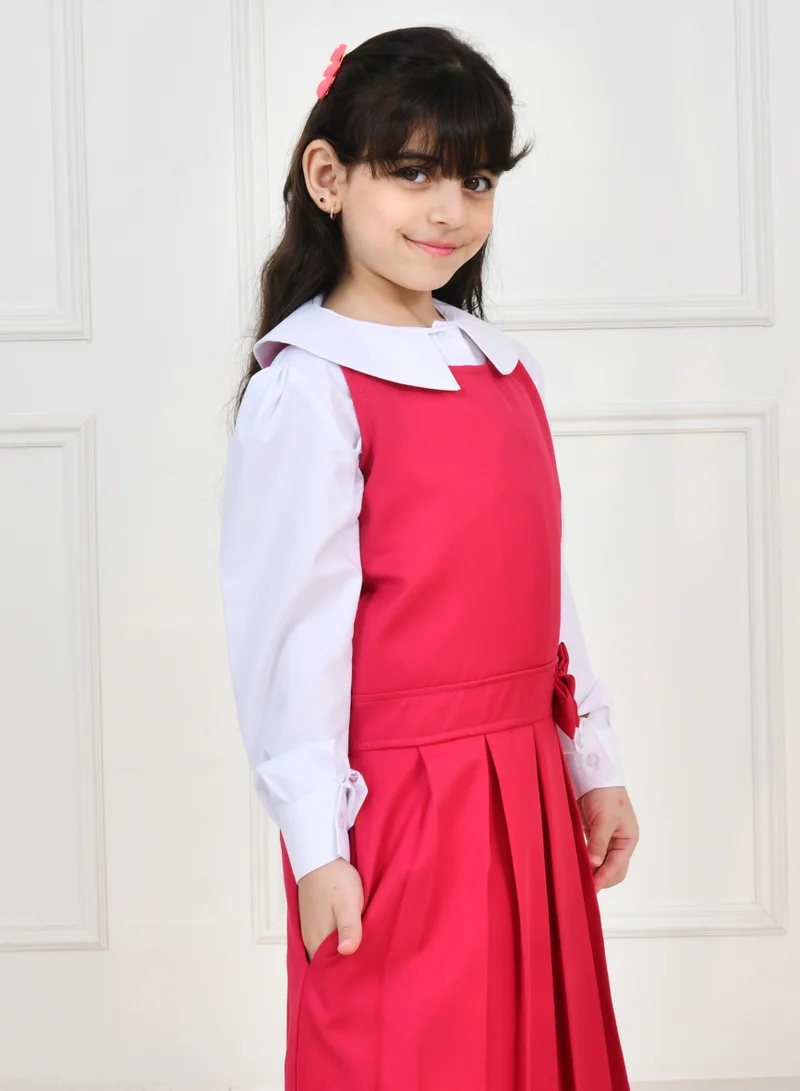 HAWRAA ABAYA Fuchsia apron with wide belt decorated with a bow and pleats with side pockets