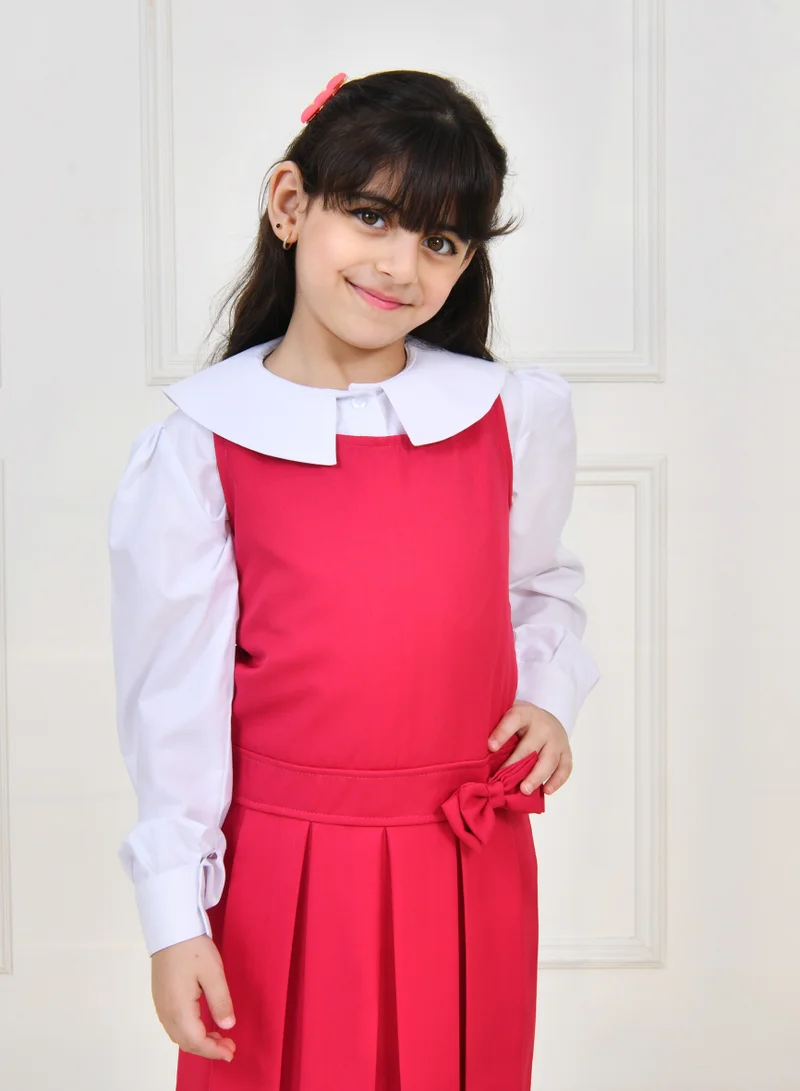 HAWRAA ABAYA Fuchsia apron with wide belt decorated with a bow and pleats with side pockets