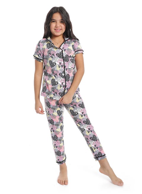 girlspejama set with buttons and patterned design