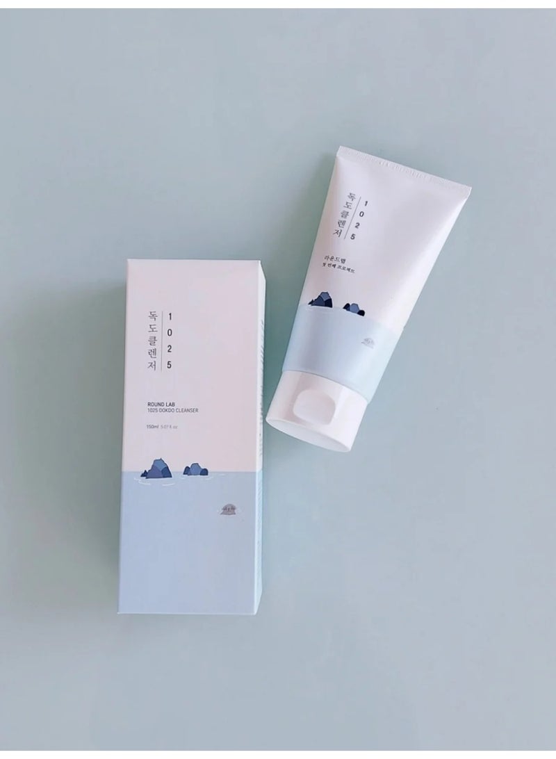 Round Lab 1025 Dokdo Cleanser is a gentle, low-pH foaming cleanser that purifies sensitive skin without stripping its moisture, available in a 150 ml size.