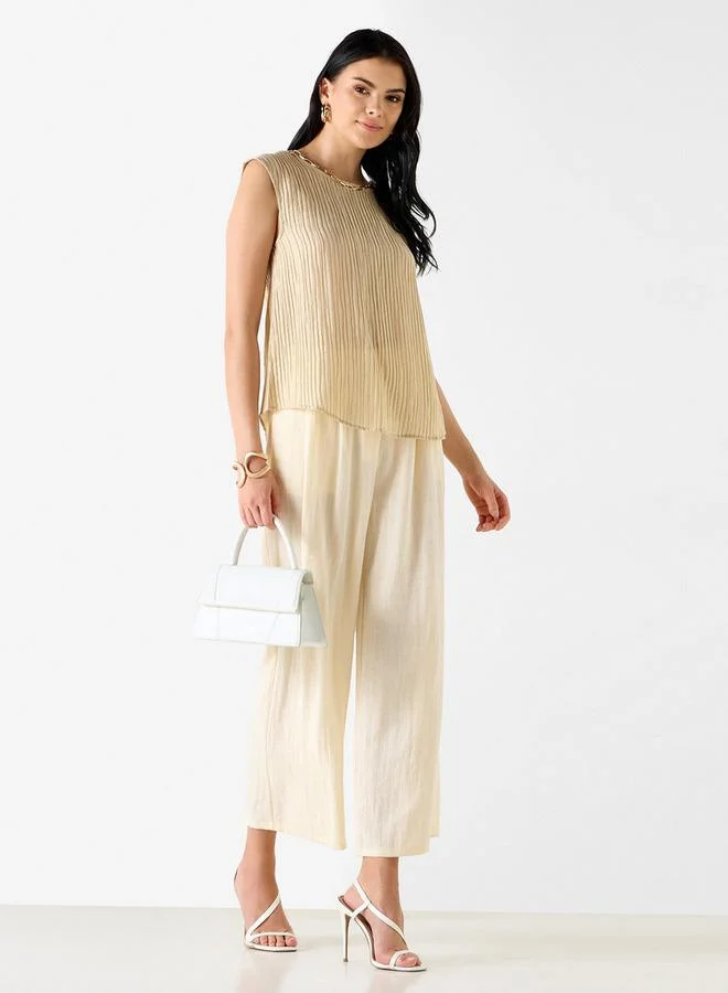 ايكونيك بلوزة بدون أكمام بياقة دائرية وكسرات من آيكونيك