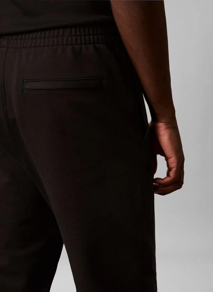 Calvin Klein  Logo Terry Cuffed Joggers for Men | Best Price UAE