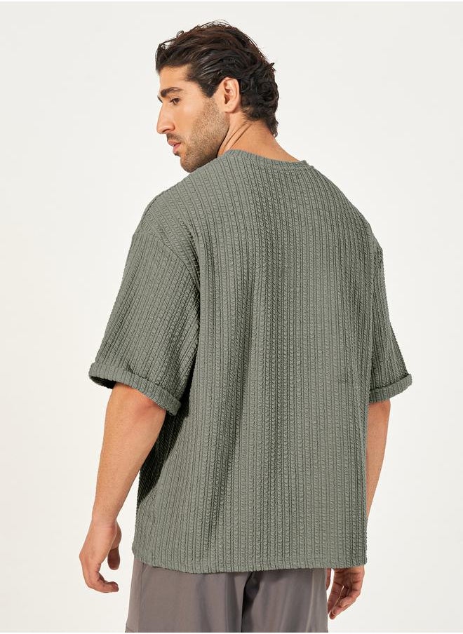 Styli Seersucker Textured Knit Boxy Fitted T-Shirt with Turn-Up Sleeves  - Image 5
