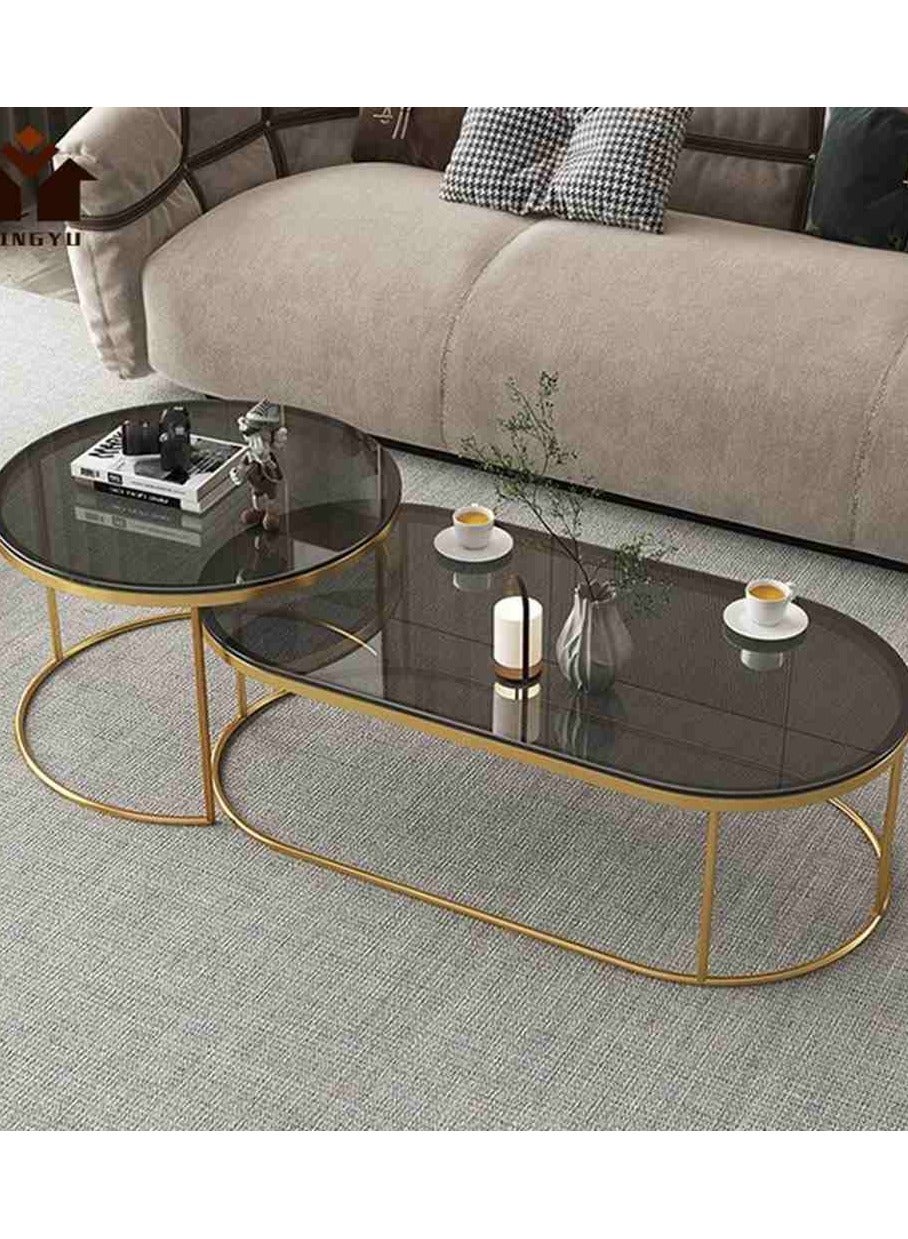 Nesting steel table set with dark glass top