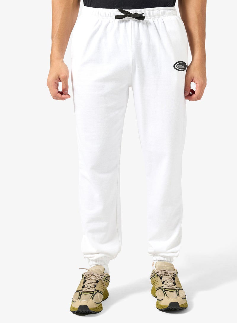 سفنتي فايف بنطلون رياضي فضفاض بتصميم جرافيك - Image 1