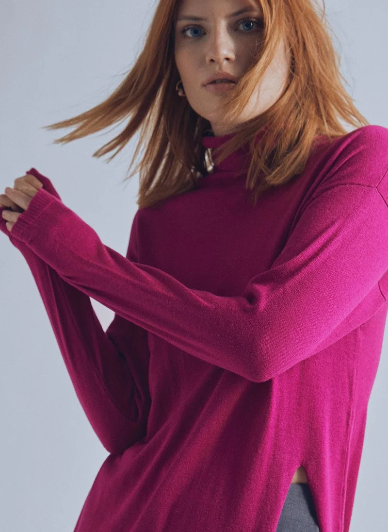 Lola Casademunt Long sweater with a high collar and slit detail