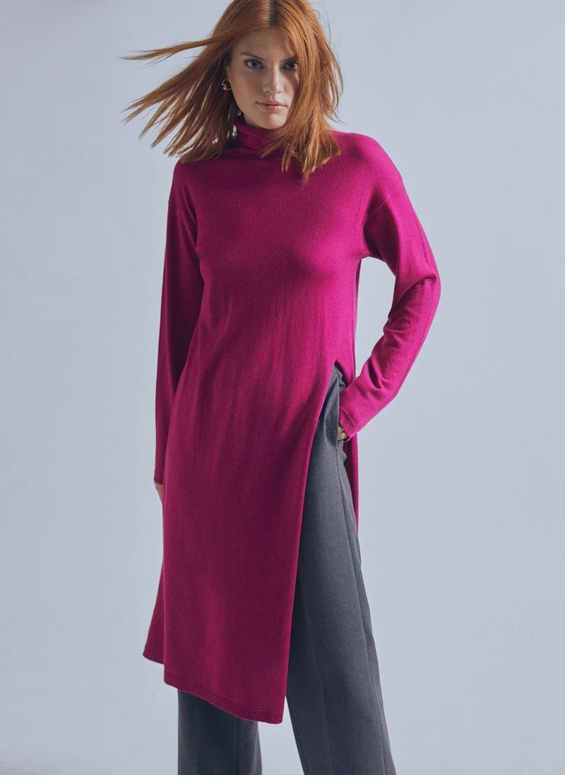 Lola Casademunt Long sweater with a high collar and slit detail
