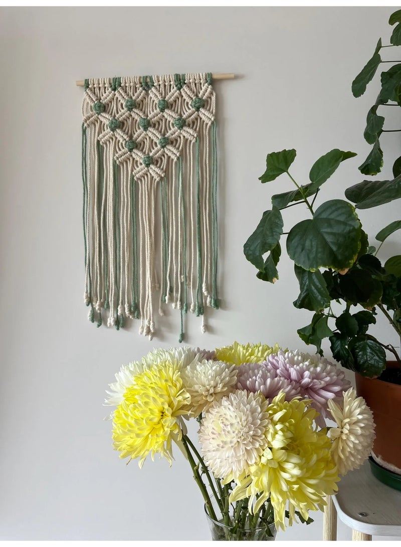 Antikiano A unique handmade macramé piece crafted with care from natural cotton threads, featuring a modern bohemian design that adds warmth and elegance to any space. It is characterized by precise knots and artistic details that bring a sense of calm and harmony. Perfect for wall decoration or as a special gift for lovers of handmade crafts and boho-style décor. - Image 1