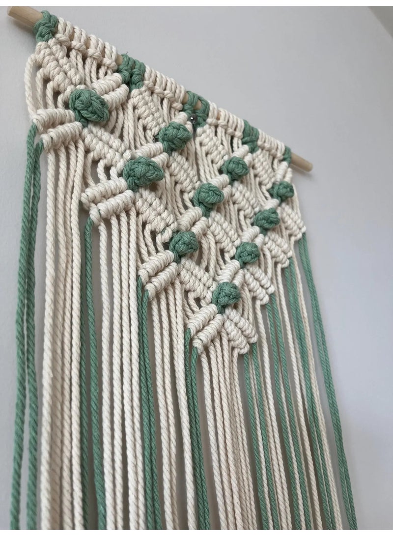 Antikiano A unique handmade macramé piece crafted with care from natural cotton threads, featuring a modern bohemian design that adds warmth and elegance to any space. It is characterized by precise knots and artistic details that bring a sense of calm and harmony. Perfect for wall decoration or as a special gift for lovers of handmade crafts and boho-style décor. - Image 4
