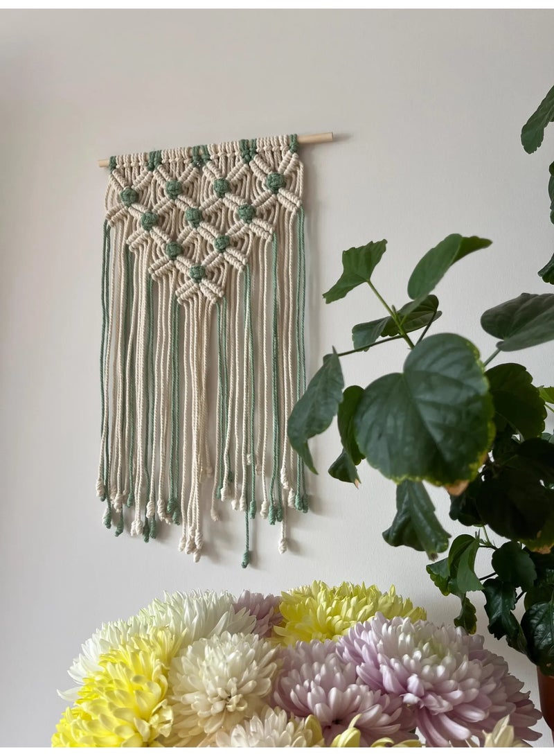 Antikiano A unique handmade macramé piece crafted with care from natural cotton threads, featuring a modern bohemian design that adds warmth and elegance to any space. It is characterized by precise knots and artistic details that bring a sense of calm and harmony. Perfect for wall decoration or as a special gift for lovers of handmade crafts and boho-style décor. - Image 2