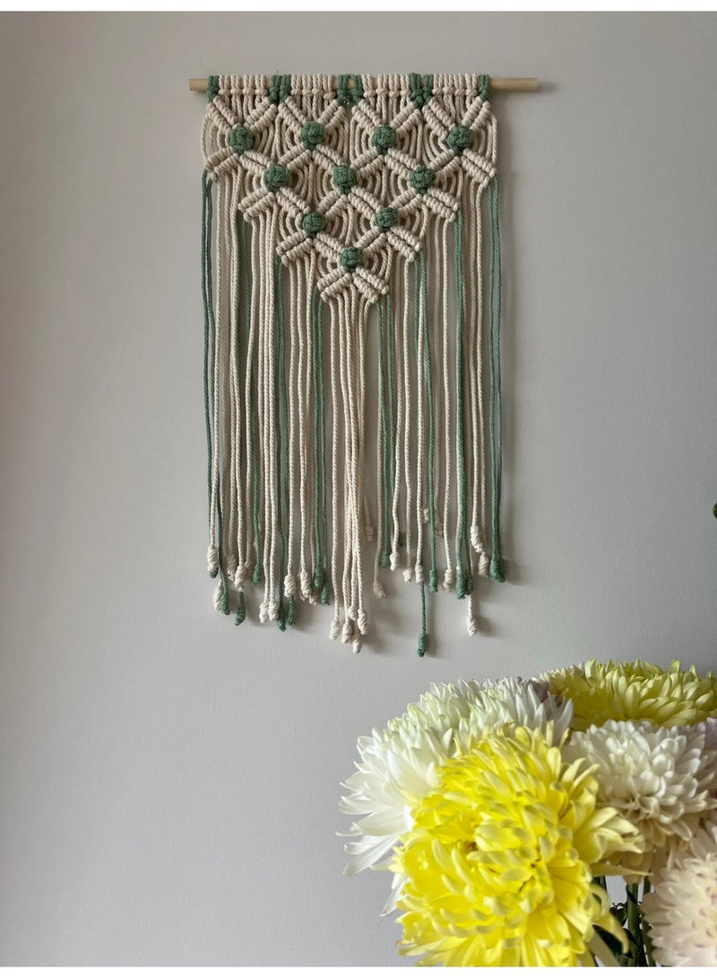 Antikiano A unique handmade macramé piece crafted with care from natural cotton threads, featuring a modern bohemian design that adds warmth and elegance to any space. It is characterized by precise knots and artistic details that bring a sense of calm and harmony. Perfect for wall decoration or as a special gift for lovers of handmade crafts and boho-style décor. - Image 3