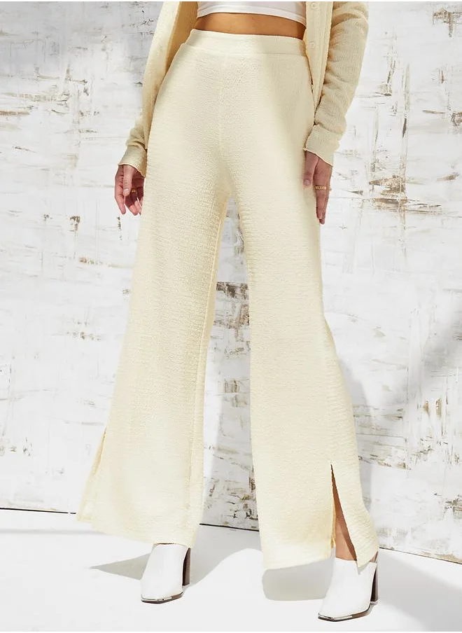 ستايلي Textured Wide Leg Trouser with Side Slit